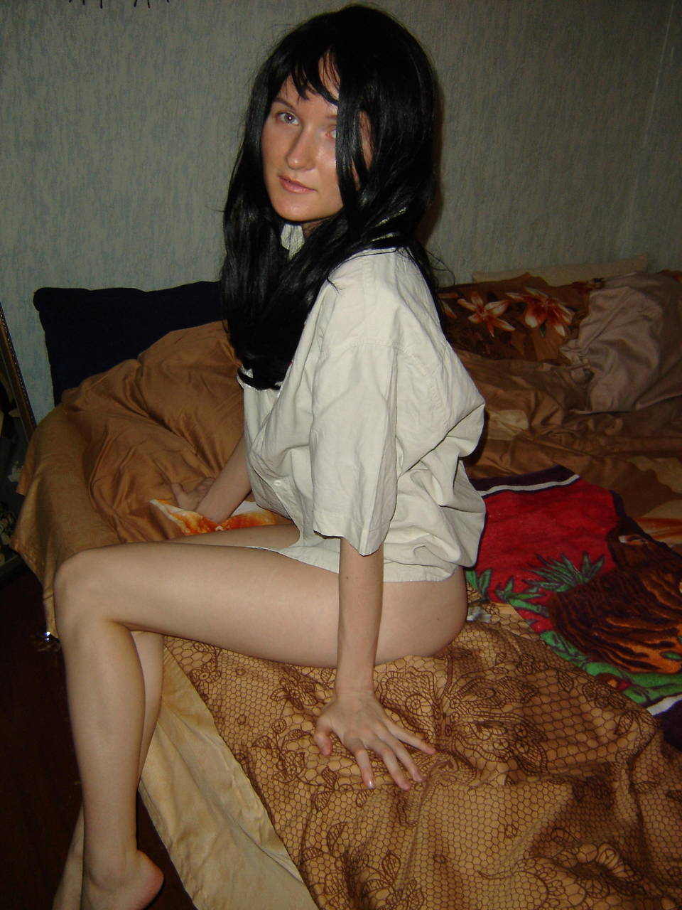 Explicit Home Photos of Woman in Lingerie Giving Blowjob