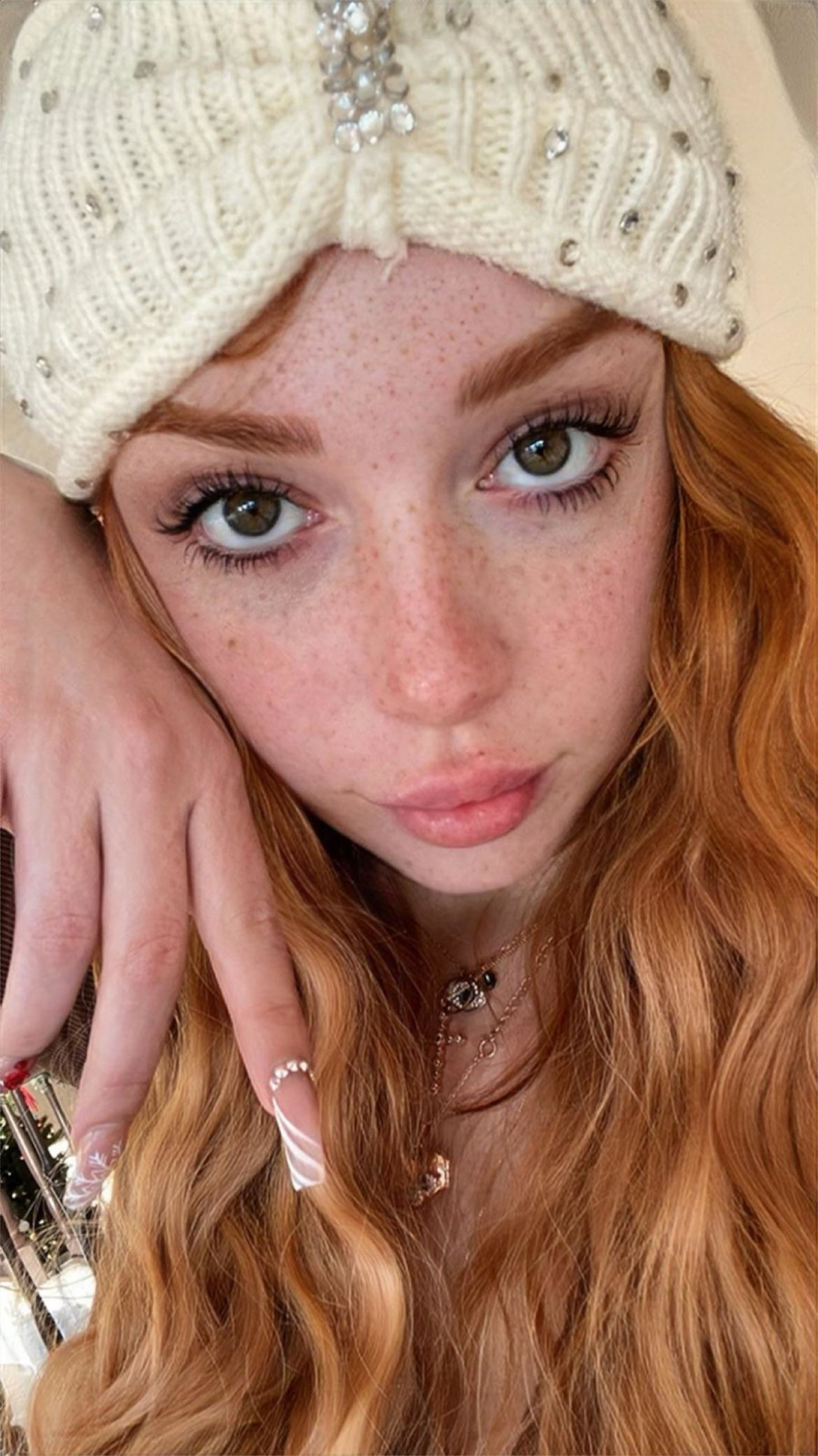 Fiery Beauty Flaunts Curves and Tempting Cleavage