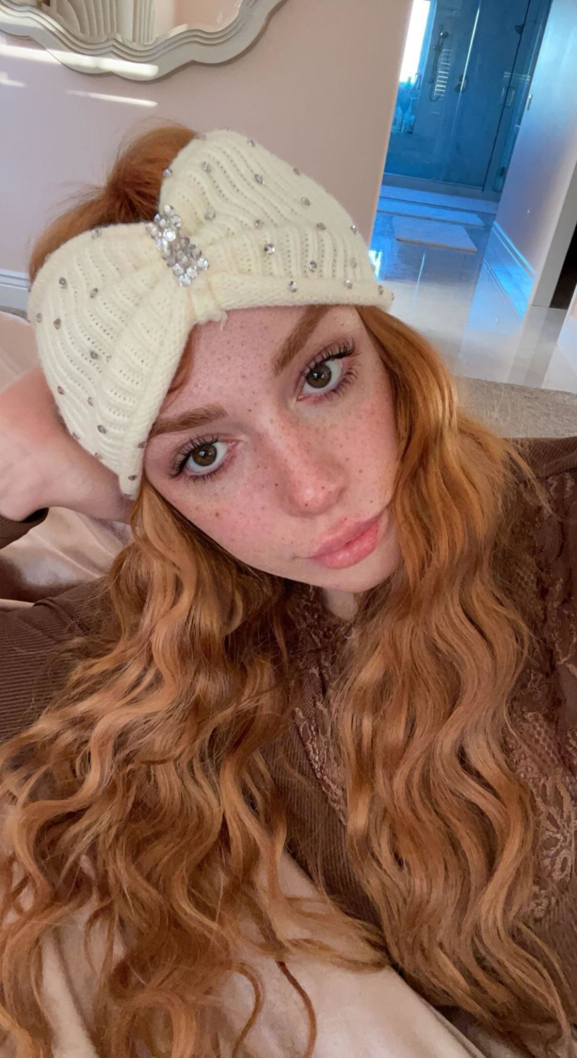 Fiery Beauty Flaunts Curves and Tempting Cleavage