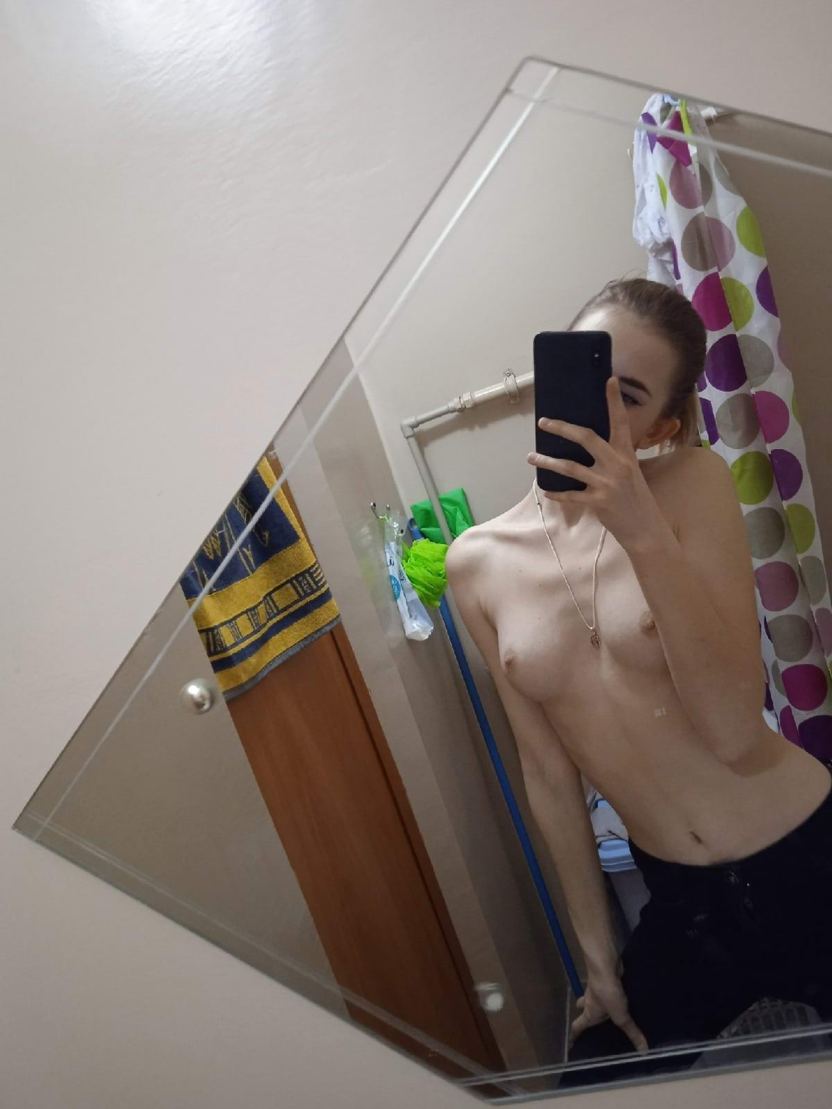 Young and attractive student flaunting her alluring and appetizing assets