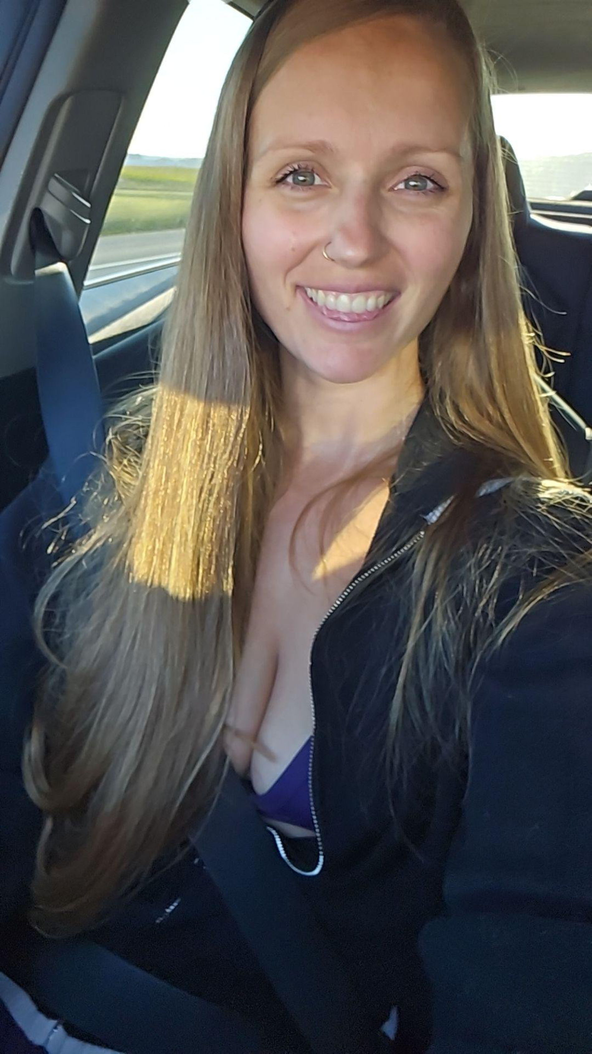 Seductive Long-Haired Lady Flaunts Her Figure and Allure for Maximum Attraction