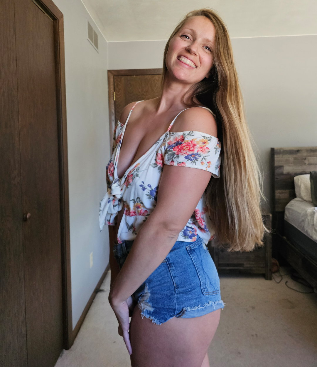 Seductive Long-Haired Lady Flaunts Her Figure and Allure for Maximum Attraction