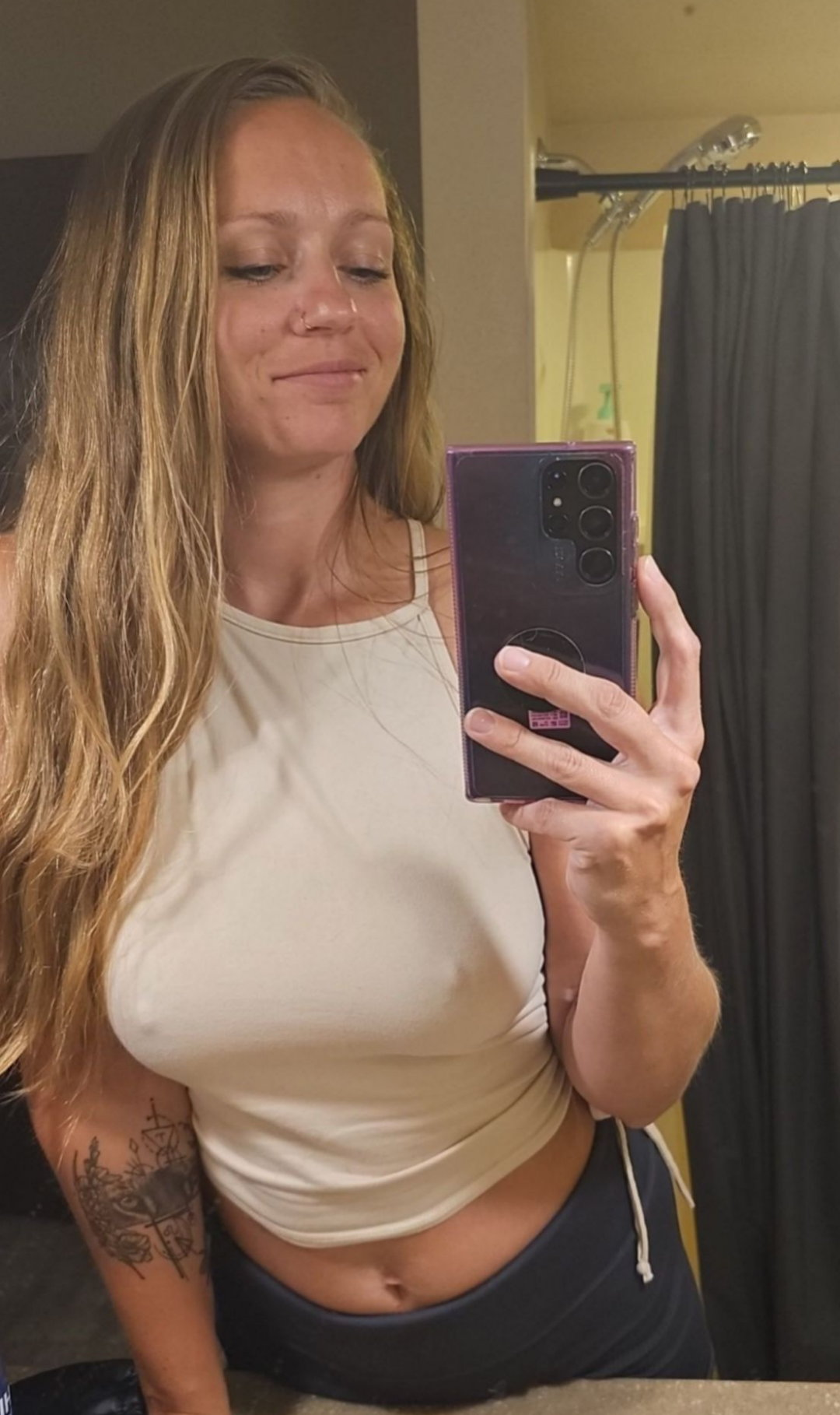 Seductive Long-Haired Lady Flaunts Her Figure and Allure for Maximum Attraction