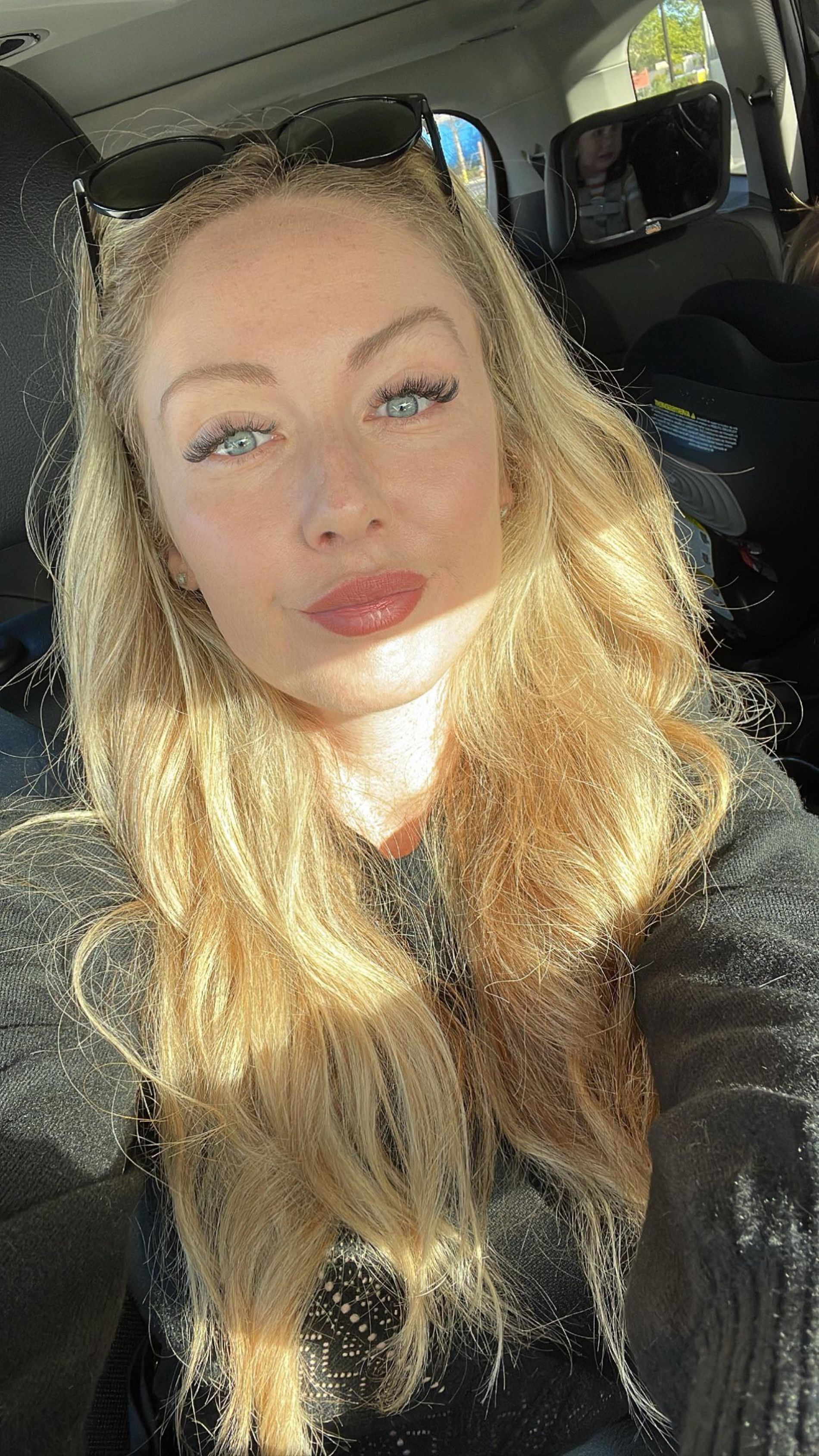 Busty Blonde Flaunts Sexy Curves and Assets