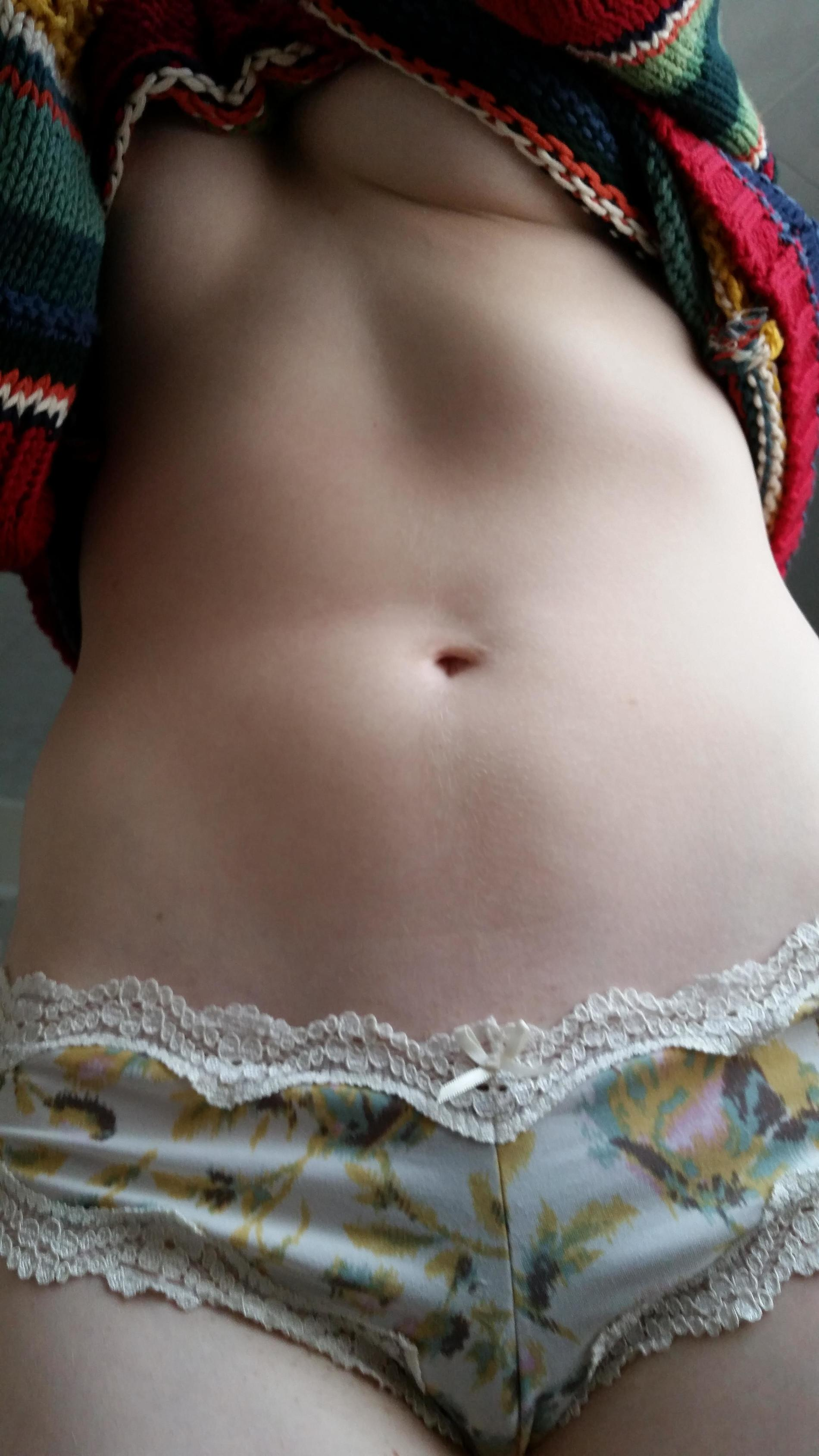 Girl with perfect body and natural private area takes selfie in front of mirror