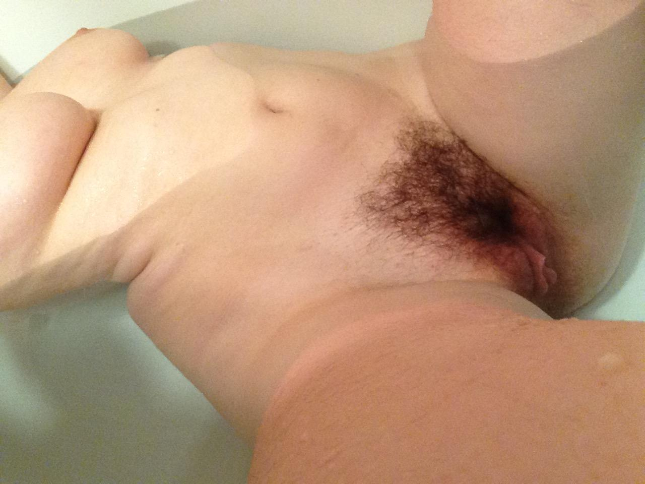 Girl Washes Her Breasts and Bushy-Haired Pussy