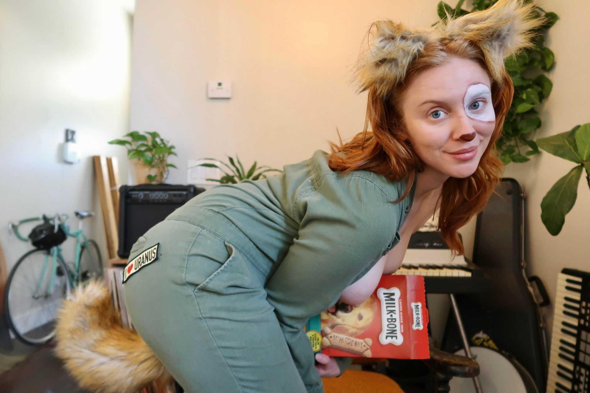 Seductive redhead girl flaunts her assets and naked body