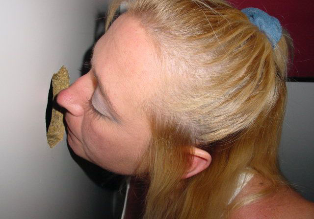 Horny woman gives blowjobs through gloryhole to multiple men