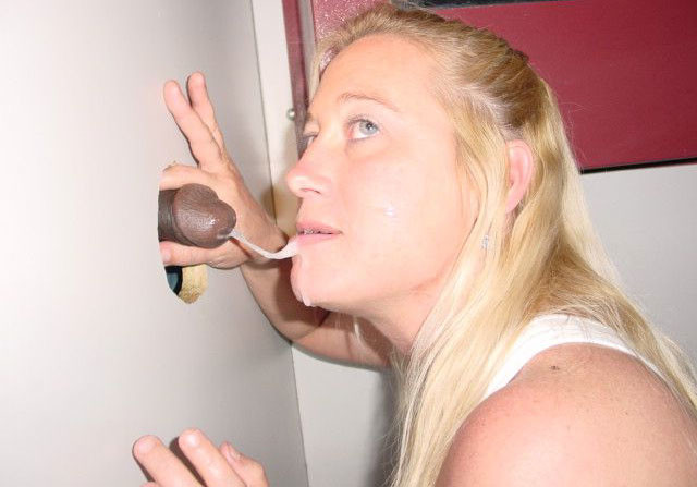 Horny woman gives blowjobs through gloryhole to multiple men