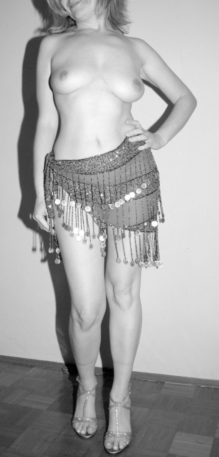 Beautiful Mature Woman in Black and White Dress Exuding Beauty and Elegance