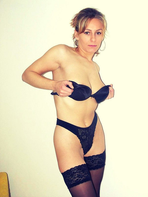 Sexy Mama Poses Seductively in Stockings