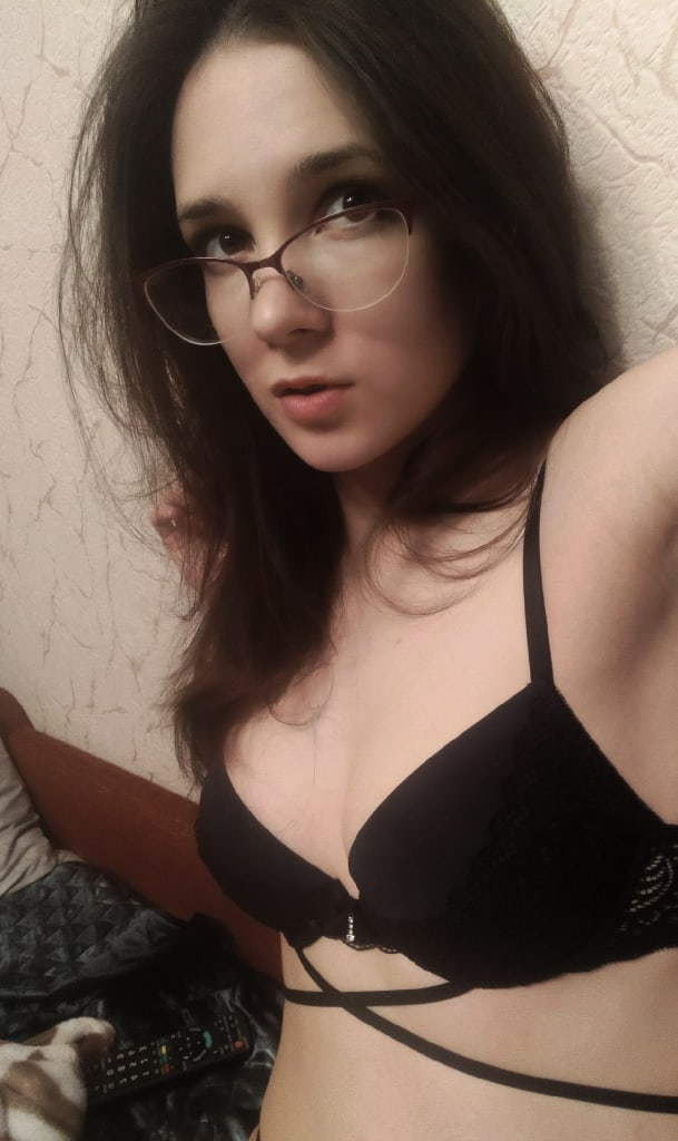 Seductive Brunette with Perfect Curves Poses Confidently