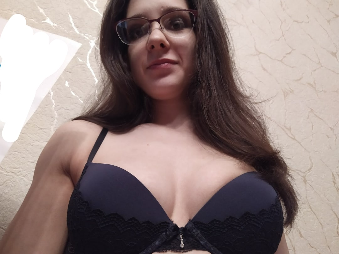 Seductive Brunette with Perfect Curves Poses Confidently