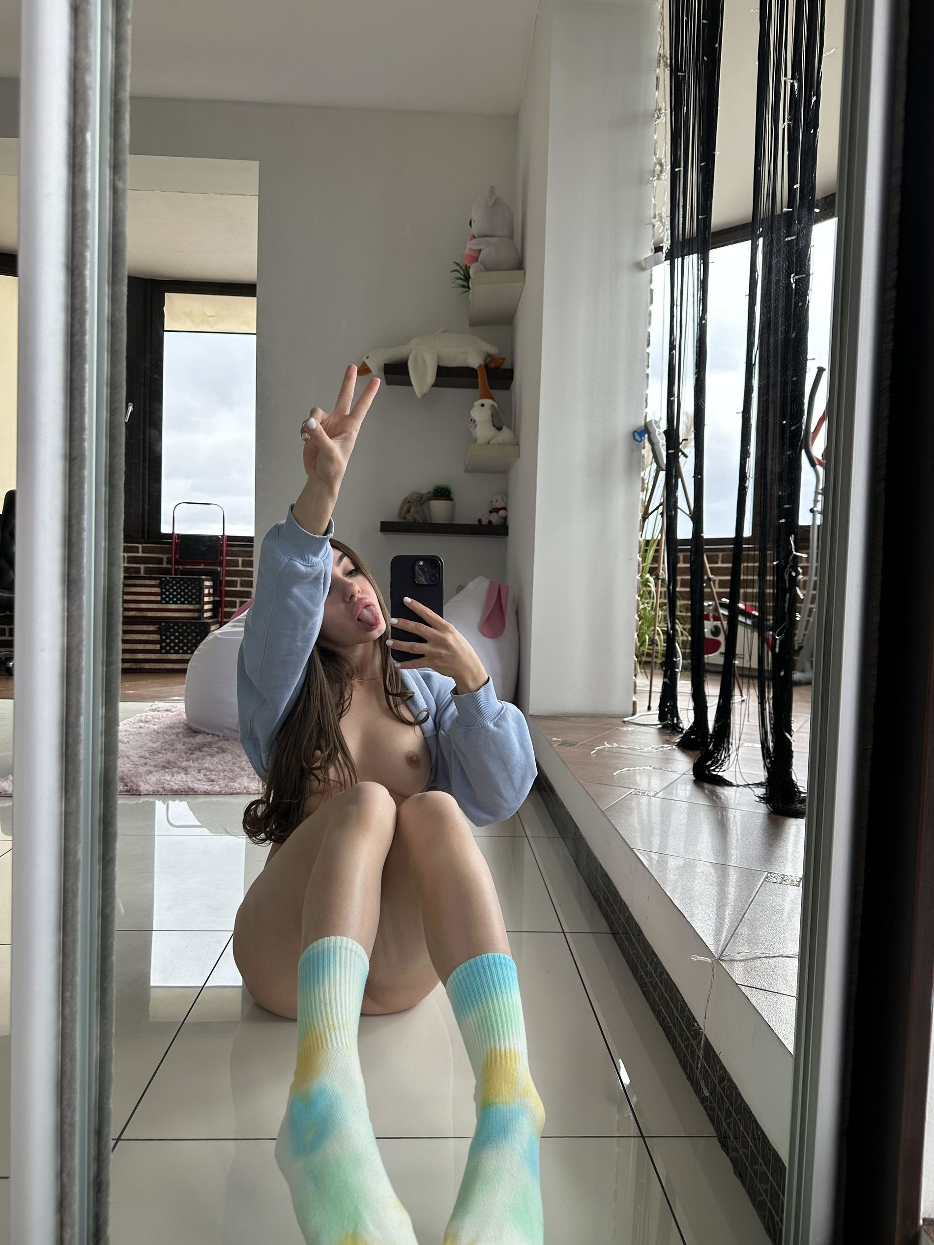 Skinny Young Lady Reveals Her Figure from Every Angle