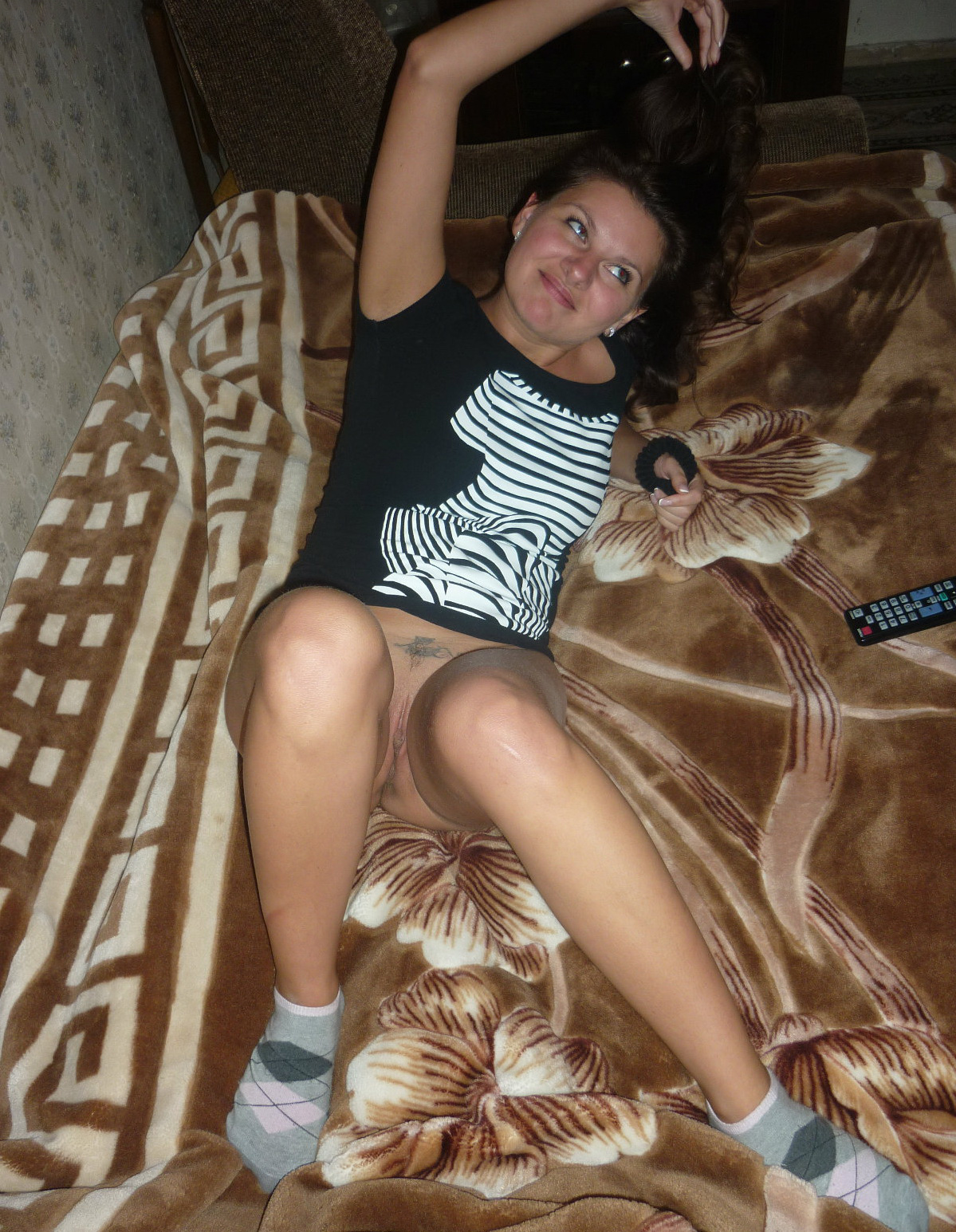 Seductive Lady with Beautiful Eyes Poses in Erotic Photos