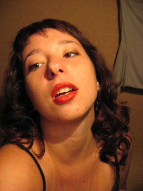 Sensual Woman Posing as Fierce Lioness in Steamy Photoshoot – photo 1