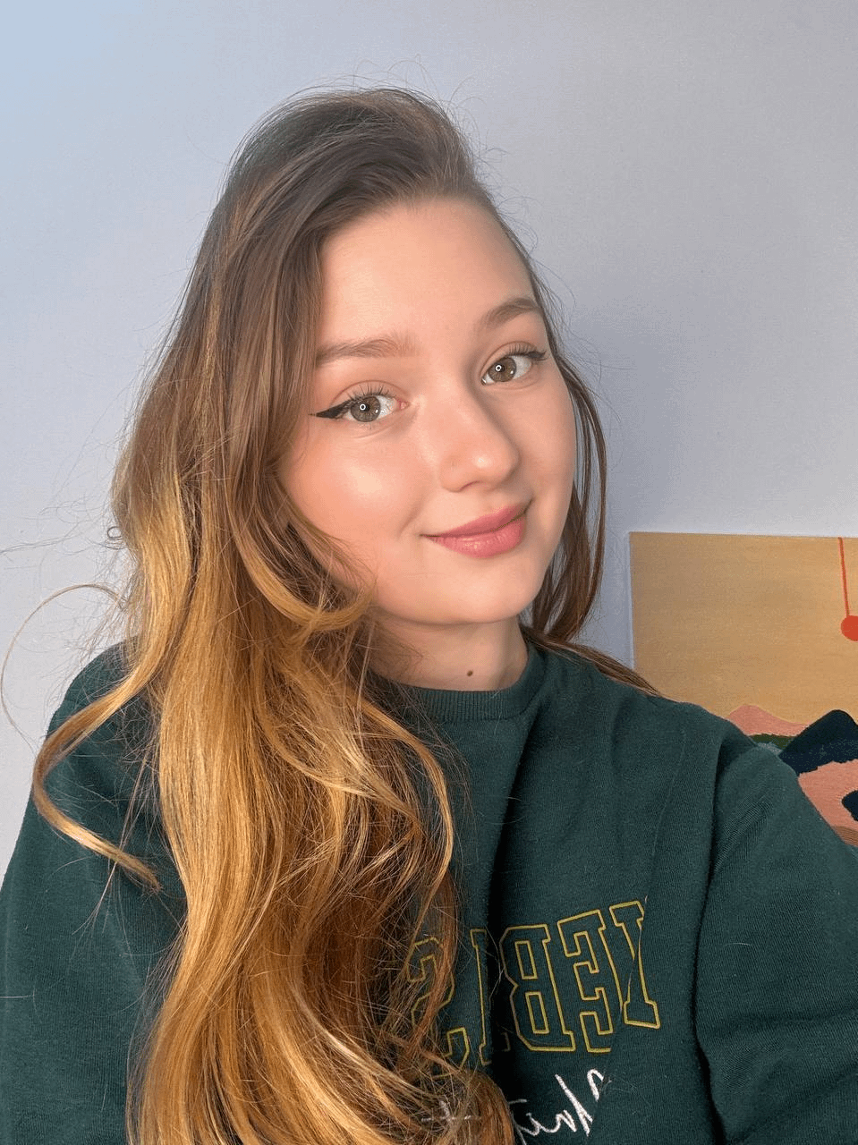 Young girl spreading legs to show holes in explicit pose