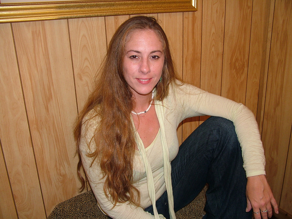 Hot MILF Exposes All on Bed: Explicit Display of Assets