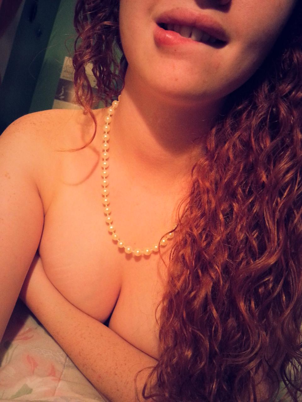 Stunning Young Woman Shows Off Beautiful Breasts and Seductive Body