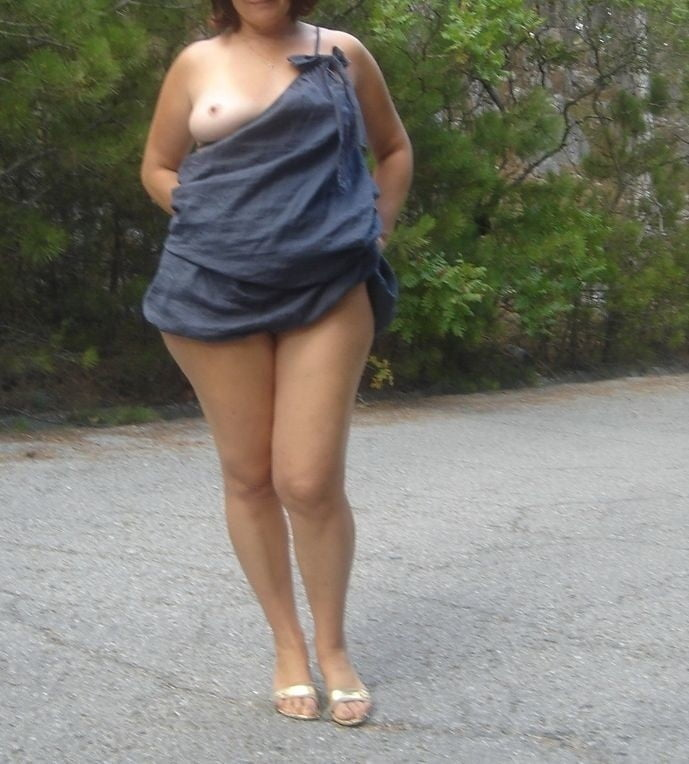 Hot mature woman looks incredibly sexy in the forest outdoors