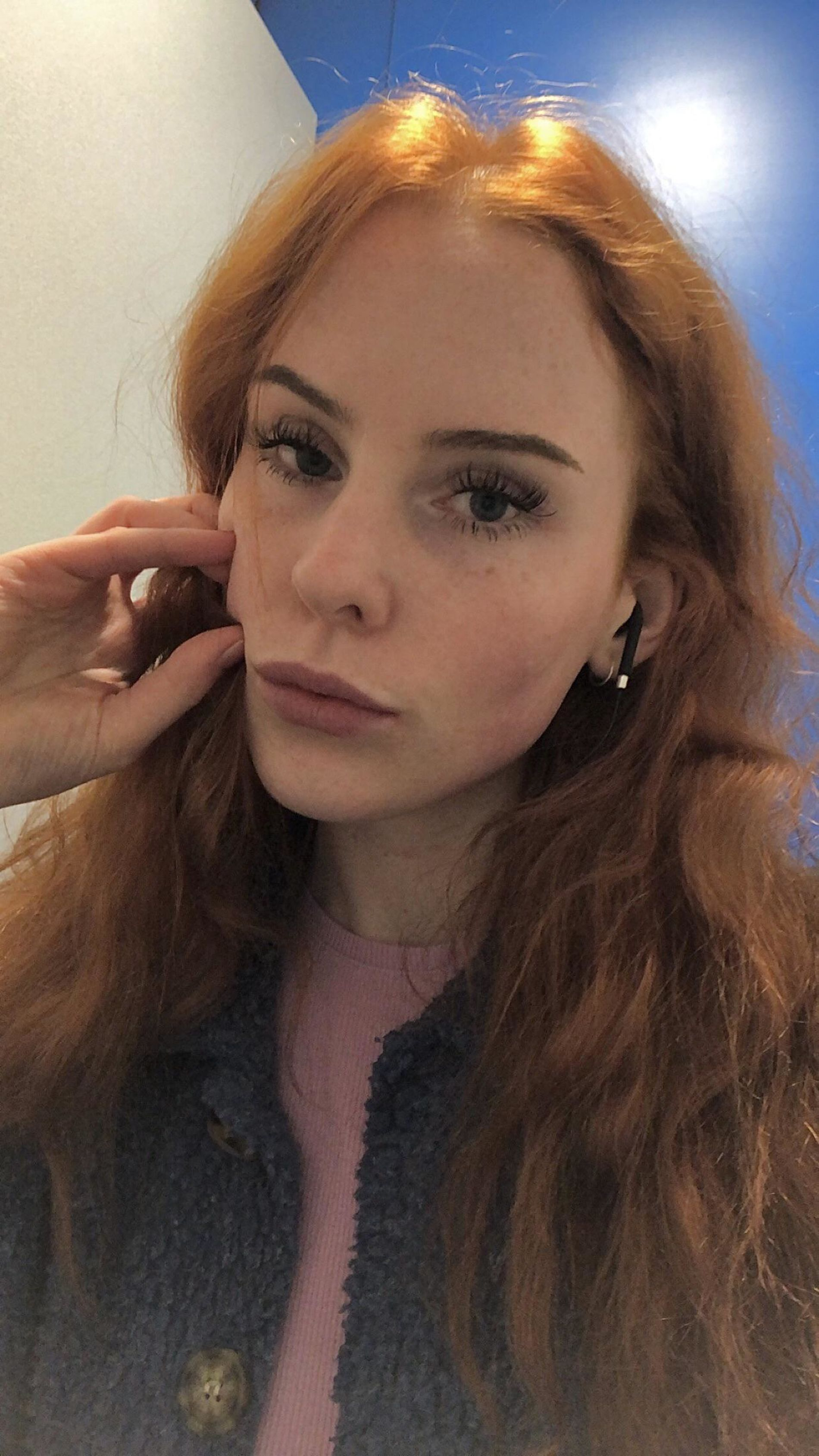 Seductive Redhead Takes Provocative Selfies at Home