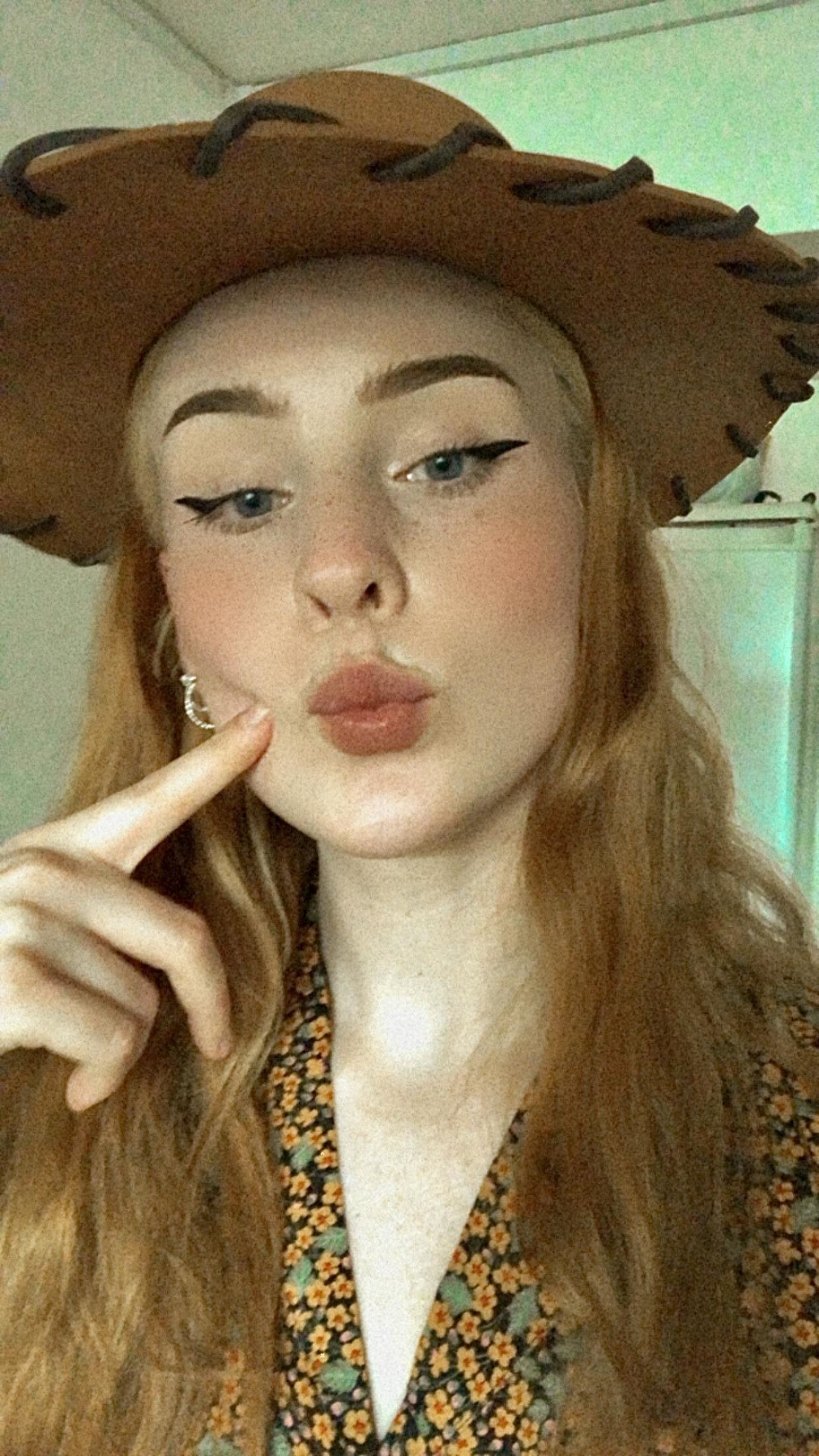 Seductive Redhead Takes Provocative Selfies at Home