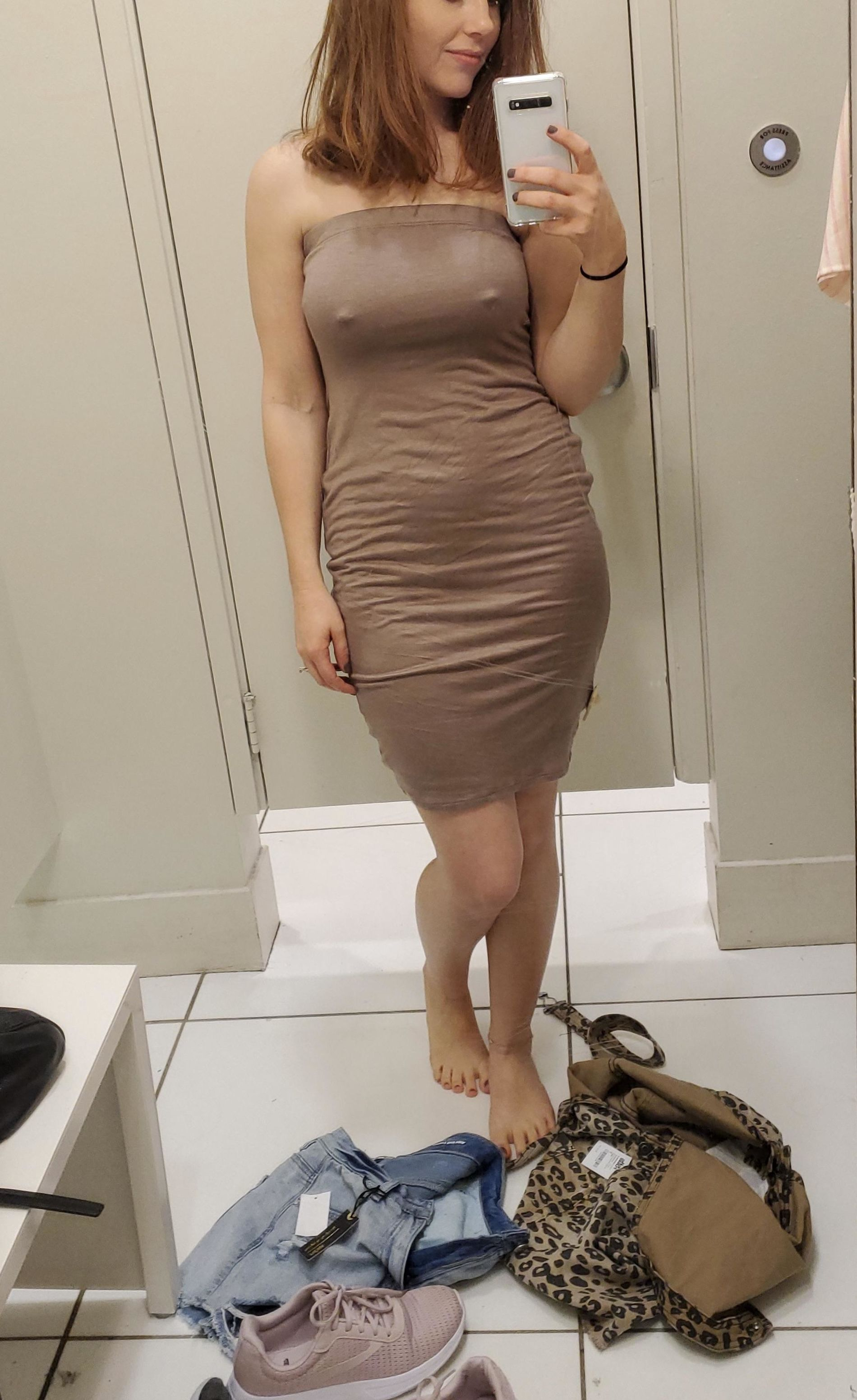 Beautiful Lady Takes Explicit Selfies in Fitting Room, Revealing Intimate Body Parts at Home