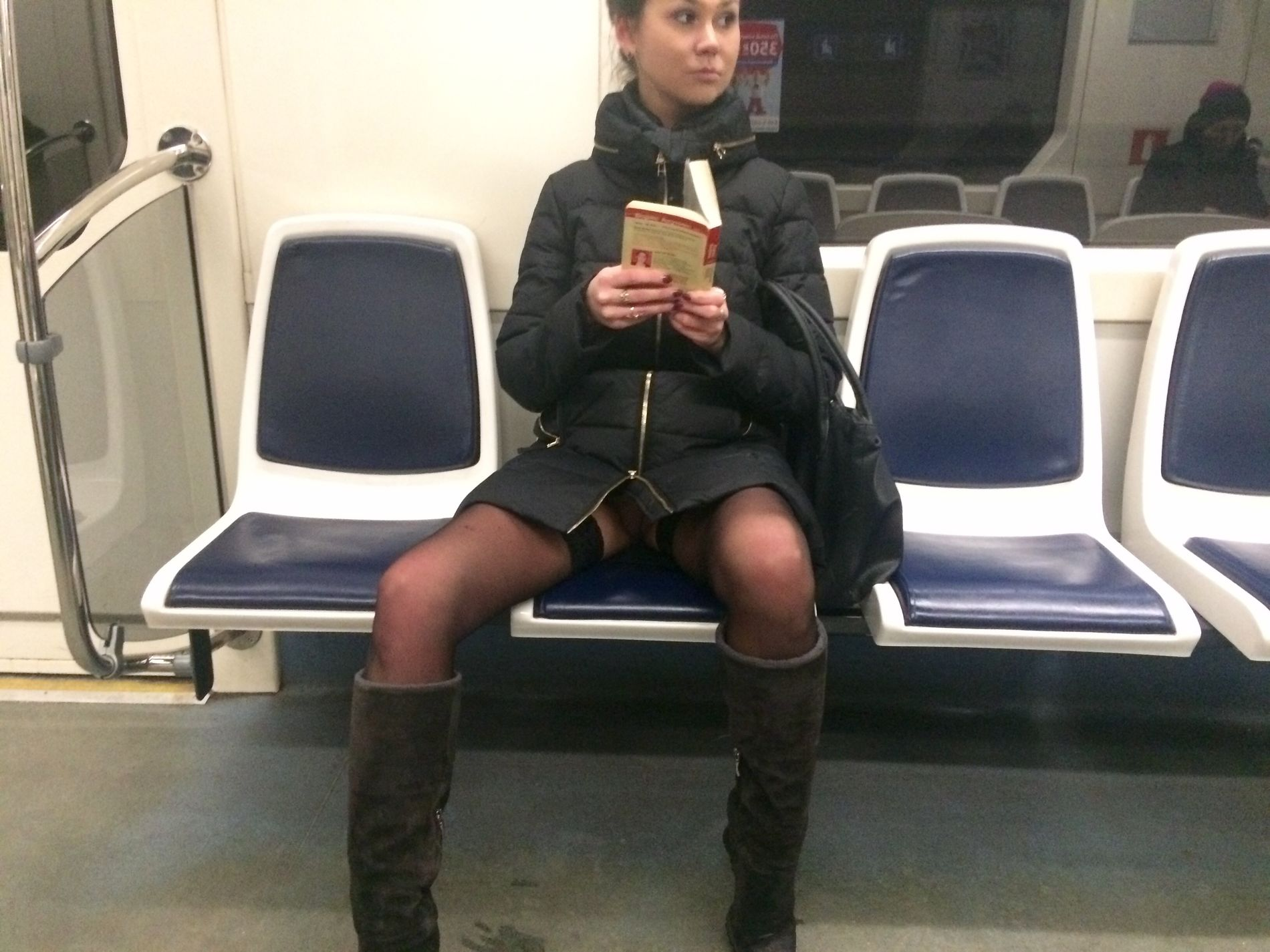 Woman in public transport without underwear, in black stockings, spreading legs, showing intimate area