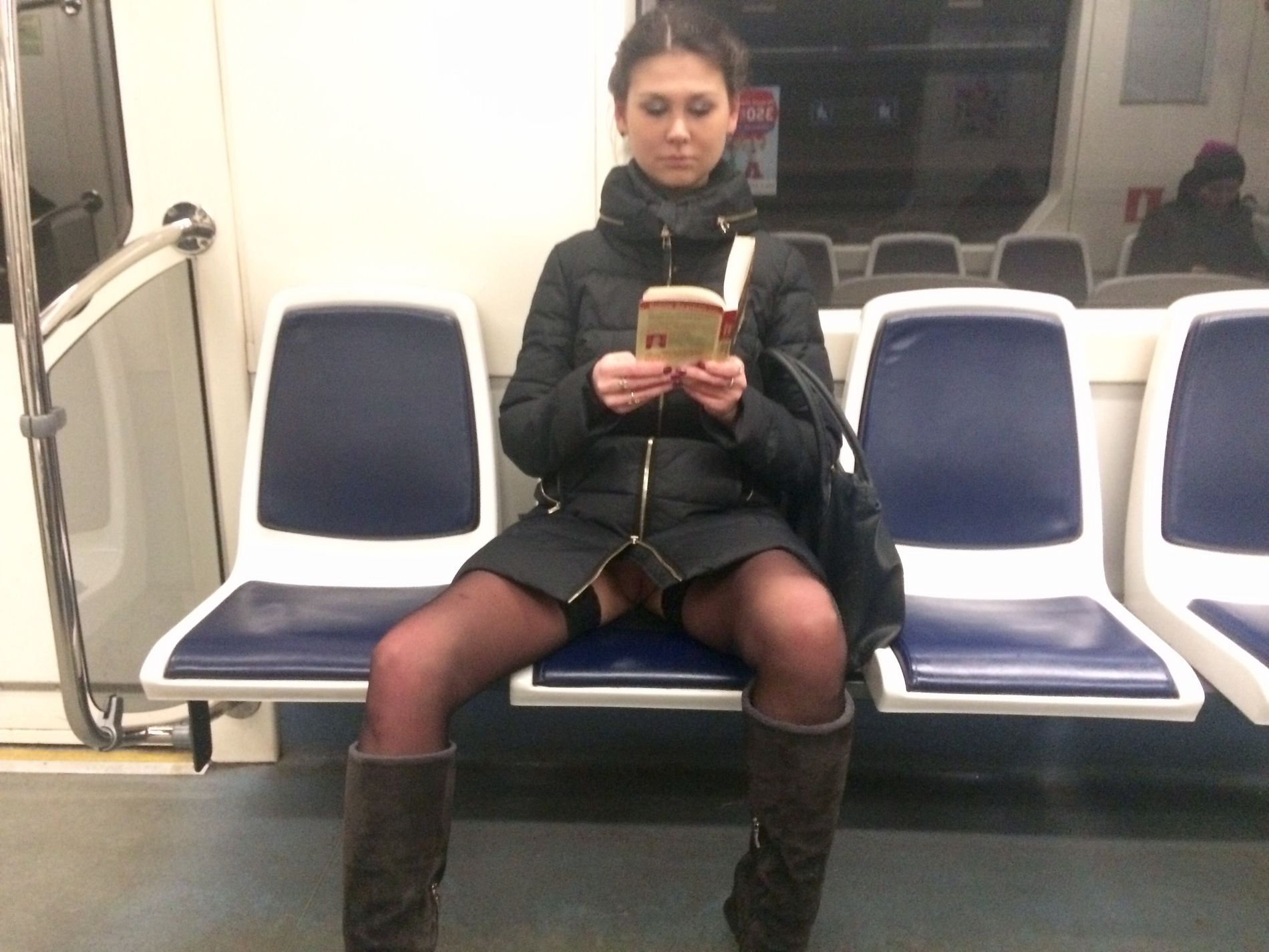 Woman in public transport without underwear, in black stockings, spreading legs, showing intimate area
