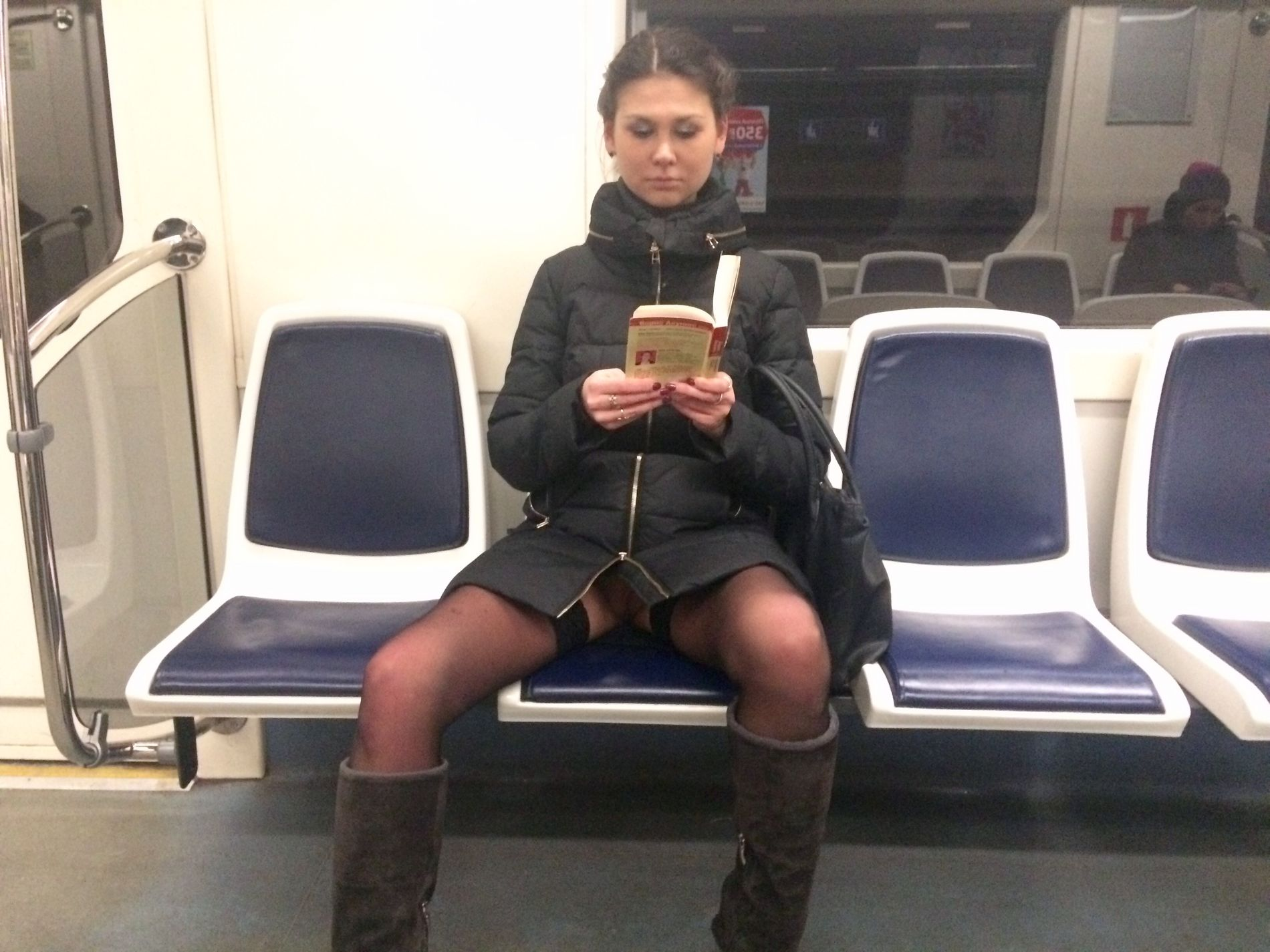 Woman in public transport without underwear, in black stockings, spreading legs, showing intimate area
