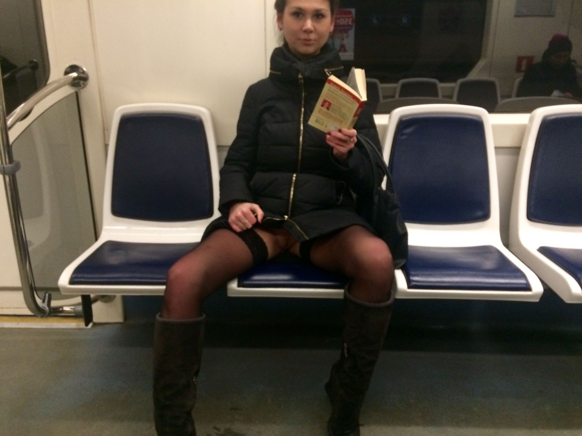 Woman in public transport without underwear, in black stockings, spreading legs, showing intimate area