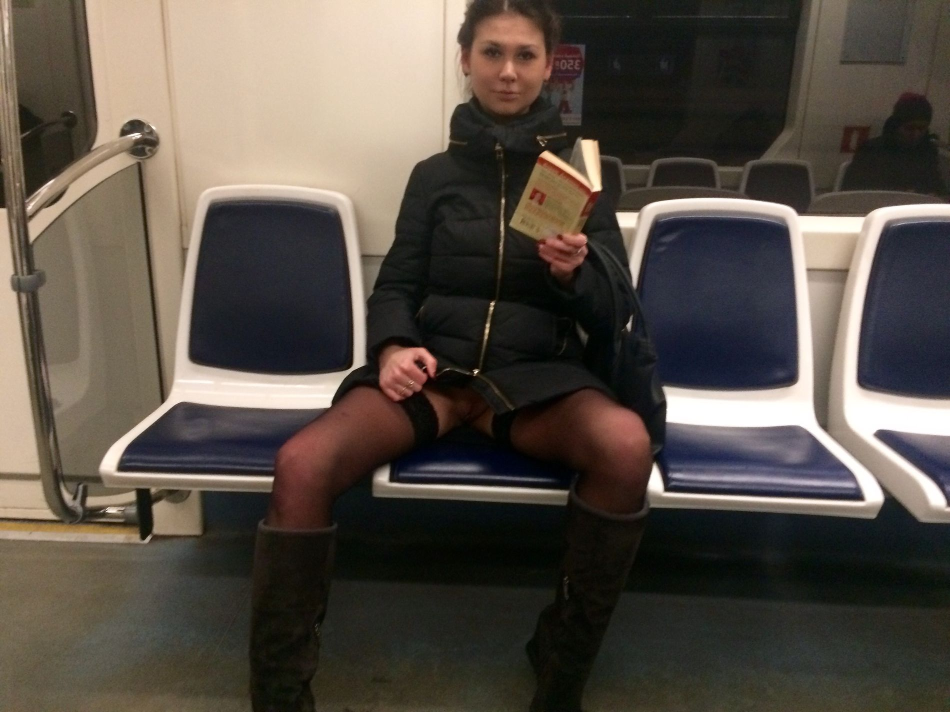 Woman in public transport without underwear, in black stockings, spreading legs, showing intimate area