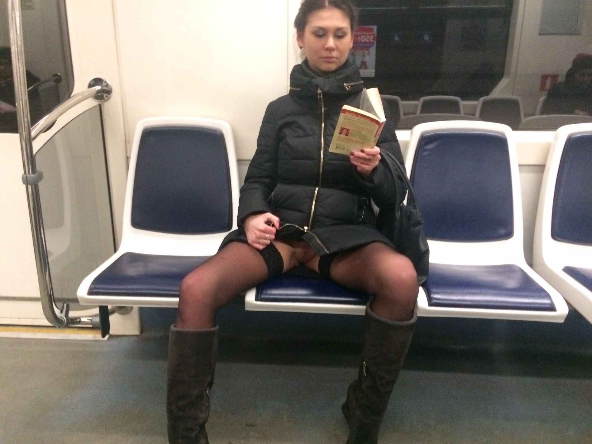 Woman in public transport without underwear, in black stockings, spreading legs, showing intimate area
