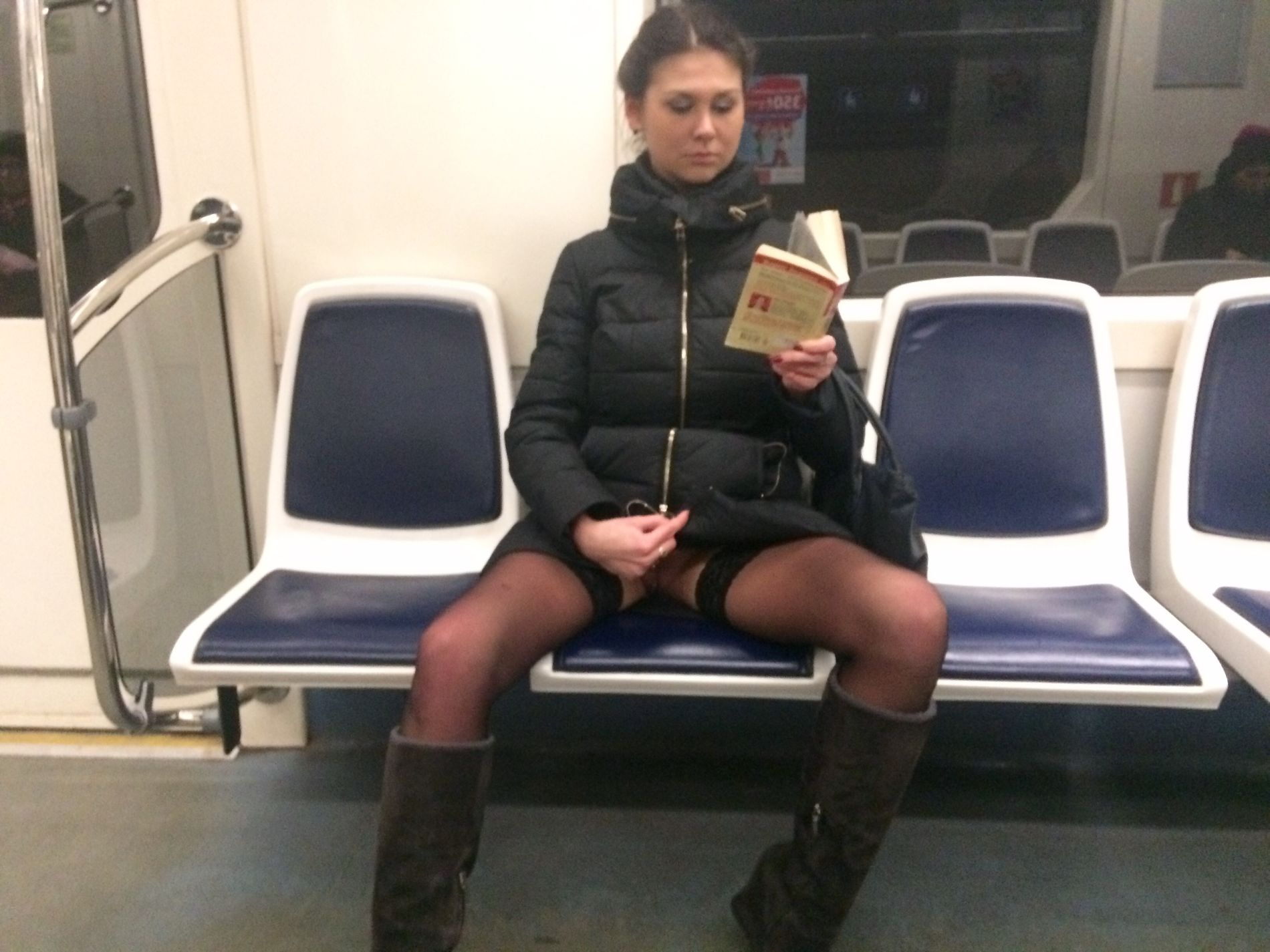 Woman in public transport without underwear, in black stockings, spreading legs, showing intimate area