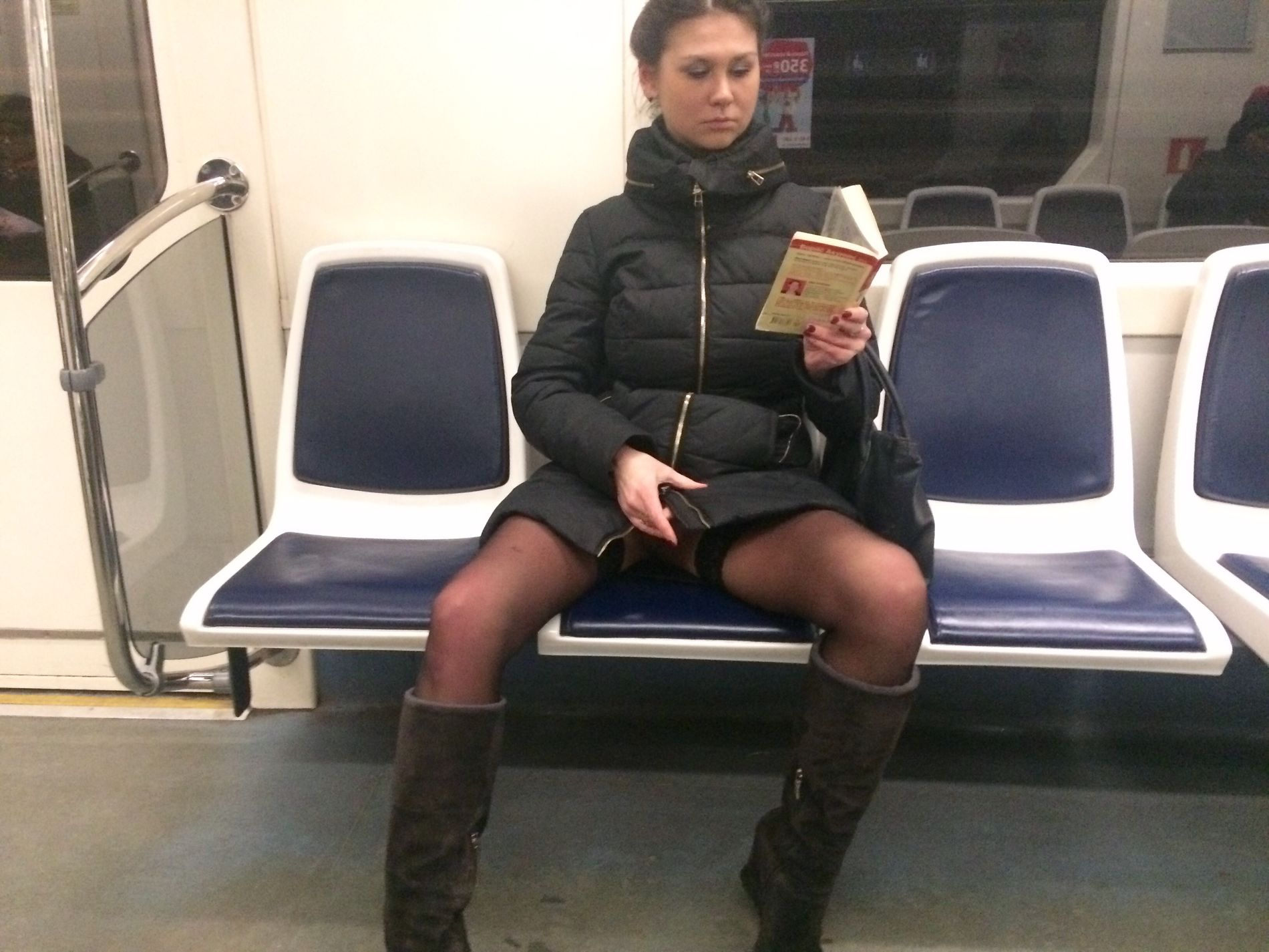 Woman in public transport without underwear, in black stockings, spreading legs, showing intimate area