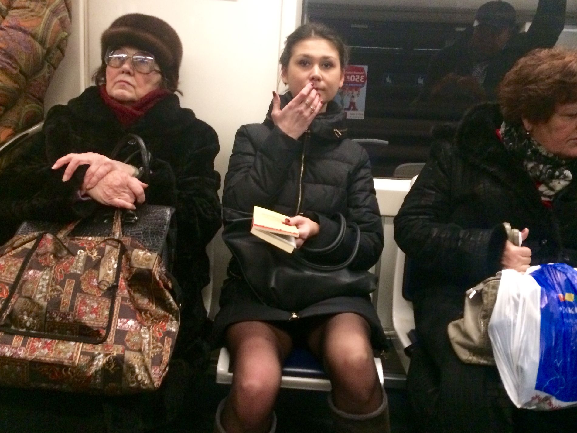 Woman in public transport without underwear, in black stockings, spreading legs, showing intimate area