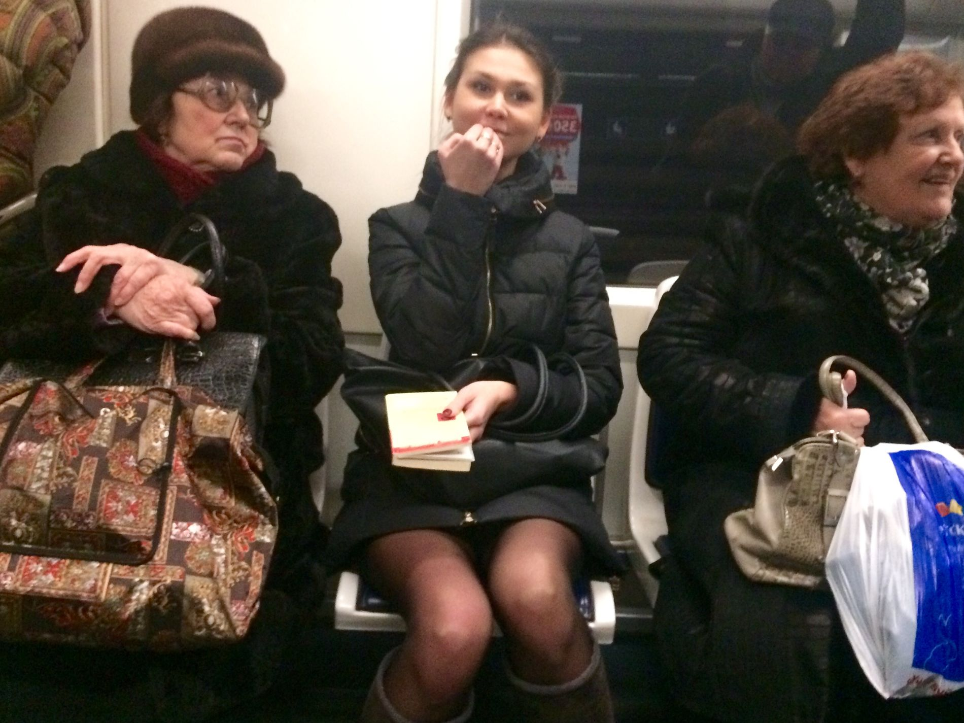 Woman in public transport without underwear, in black stockings, spreading legs, showing intimate area