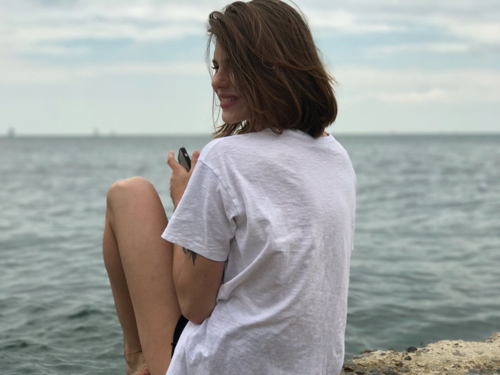 Young girl with tattoos having sex and showing intimate parts in porn photos