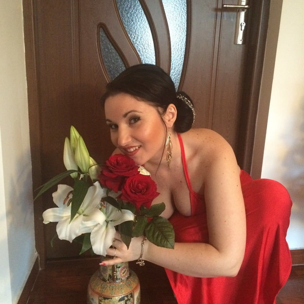 Woman in New Year's costume performs explicit striptease show