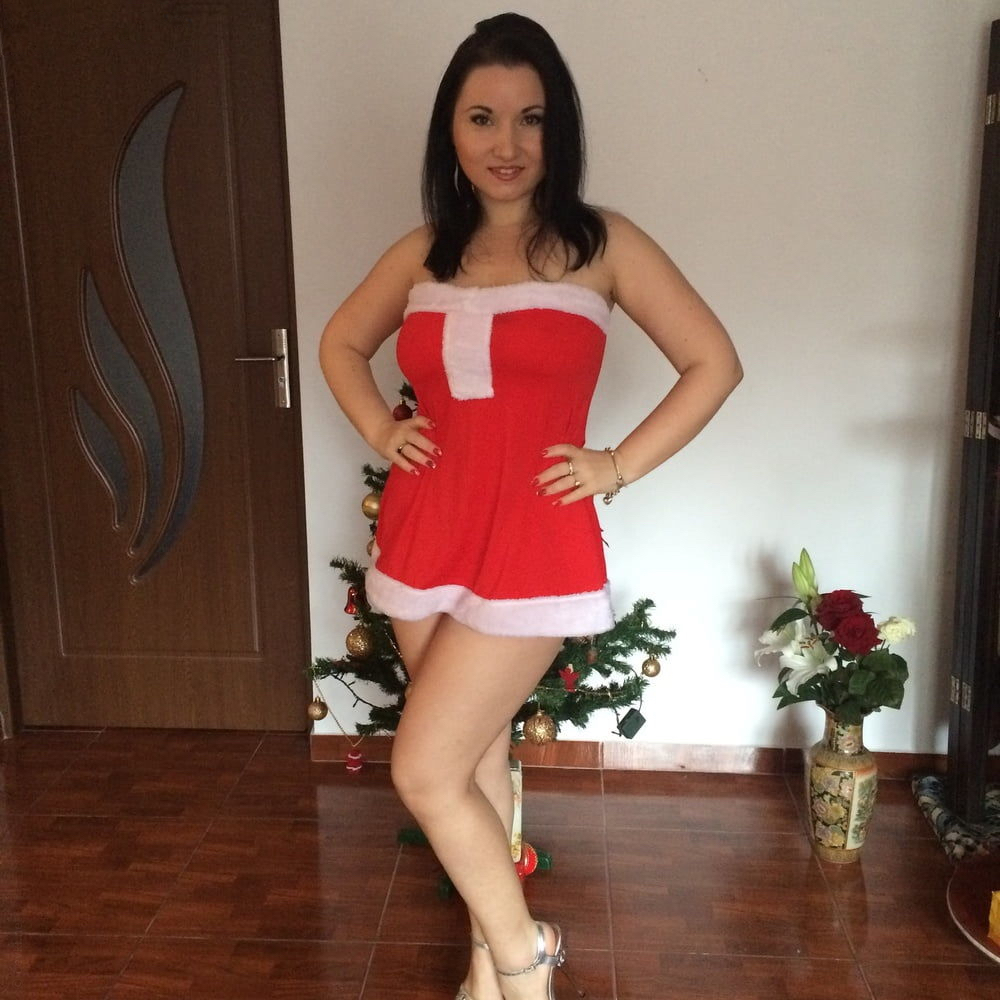 Woman in New Year's costume performs explicit striptease show – photo 1